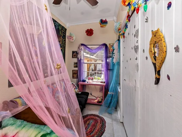 a bathroom with a sink and a curtain