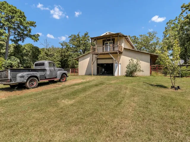 a view of a car parked in front of a house