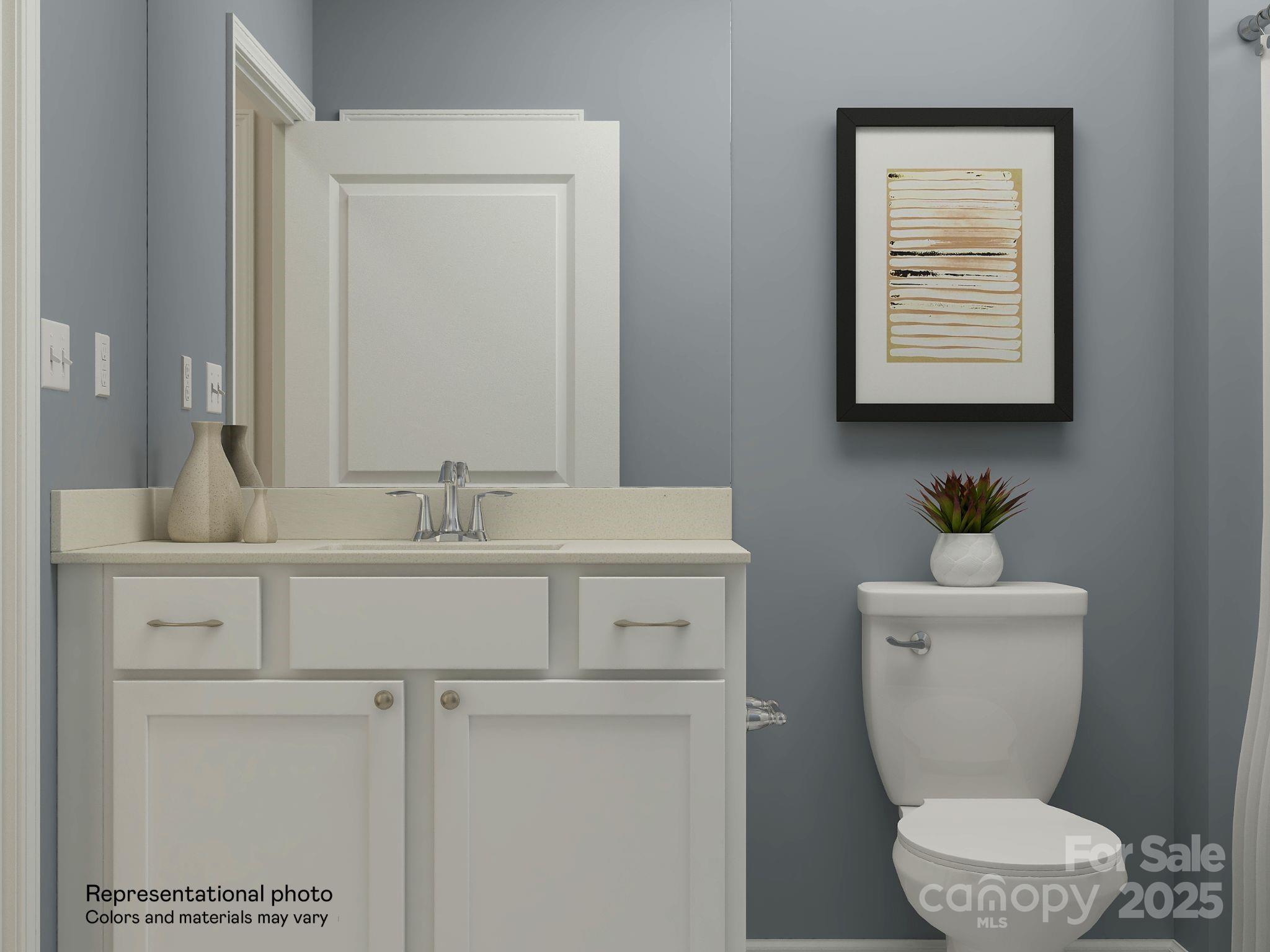 2281 Moon Crst Road Lancaster, SC 29720 - Photo 14 of 25 a bathroom with a sink a toilet and mirror