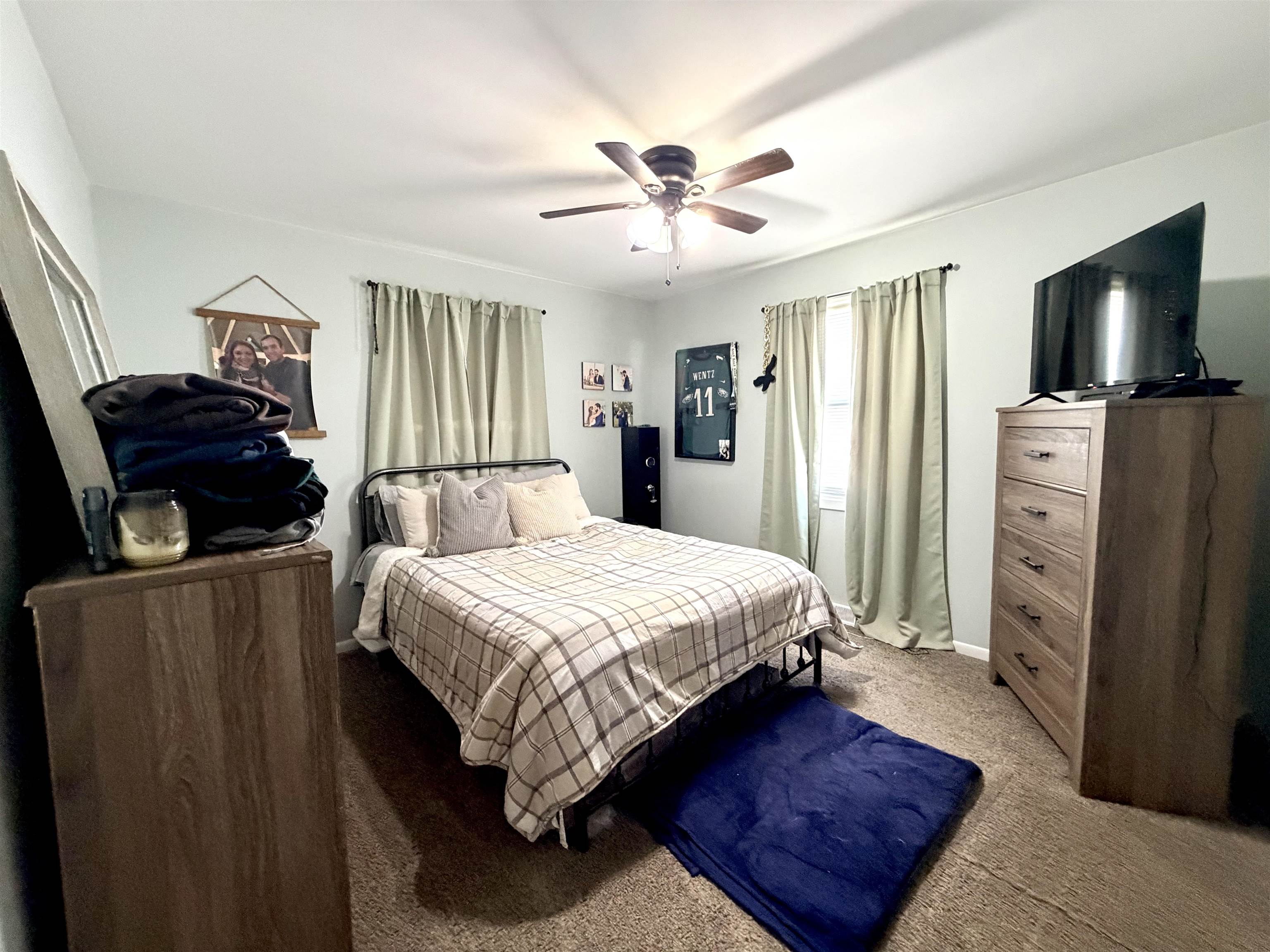 48 Siegtown Road Cape May Court House, NJ 08210 - Photo 13 of 21 a bedroom with a bed and a television