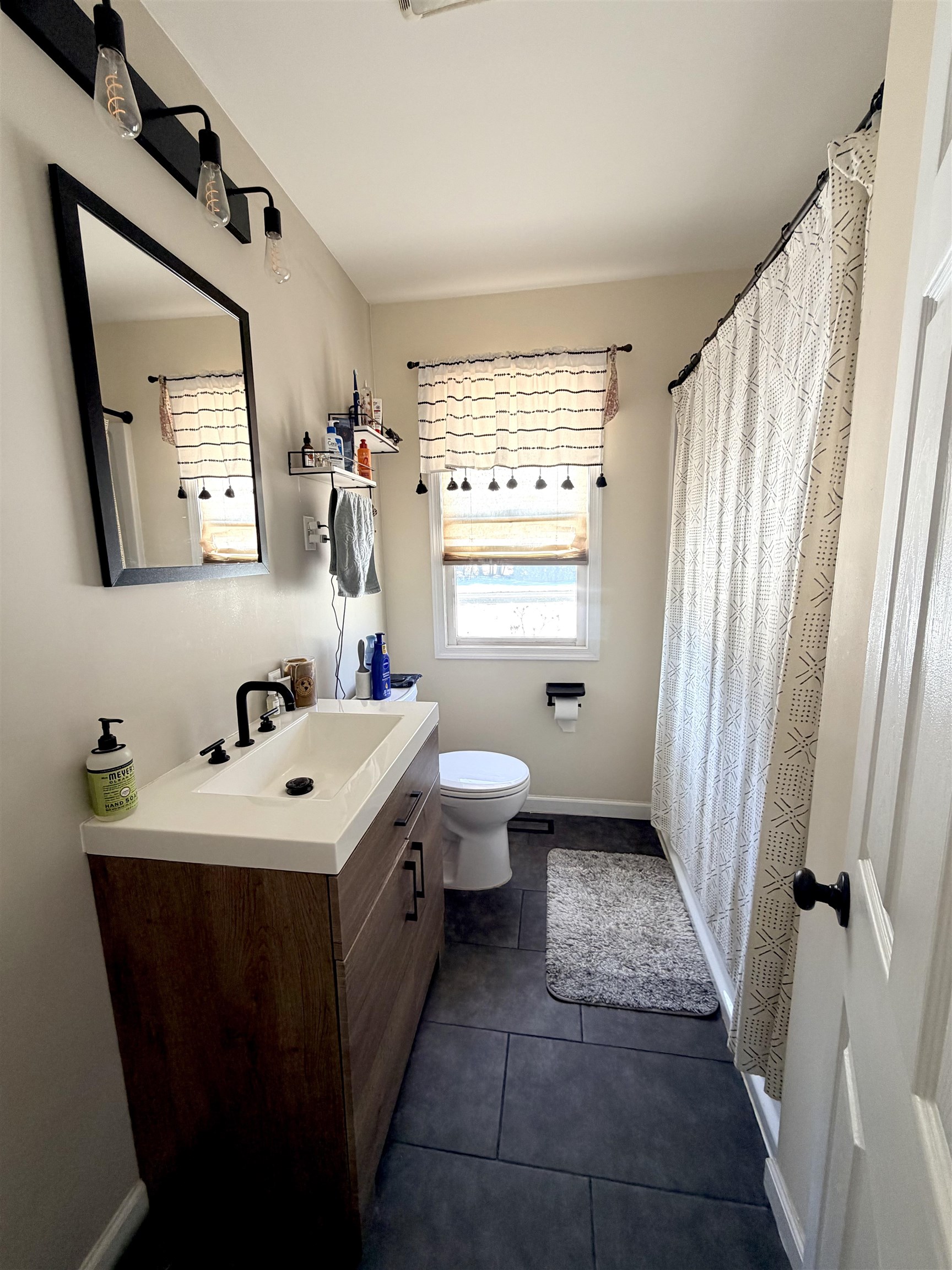 48 Siegtown Road Cape May Court House, NJ 08210 - Photo 14 of 21 a bathroom with a sink toilet and a mirror