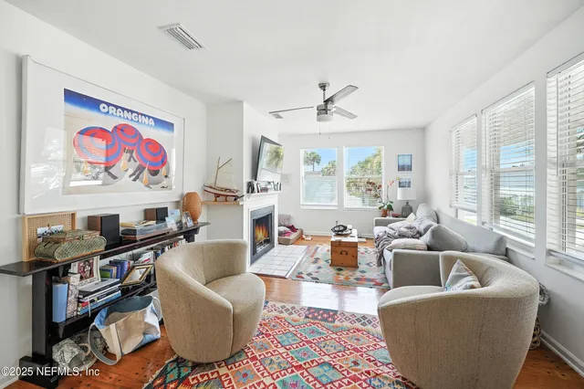 a bathroom with a bathtub a sink and a shower curtain