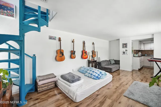 a bathroom with a sink toilet a mirror and shower