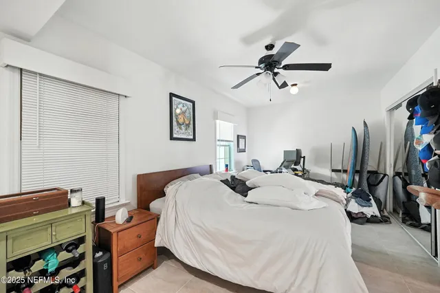 an aerial view of residential building with parking