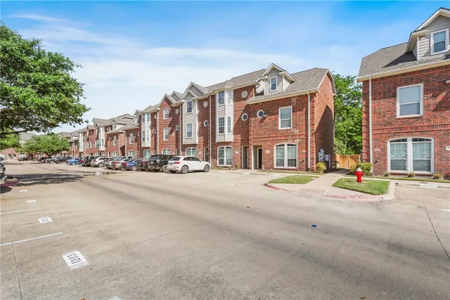 a view of a street with a building in front of it