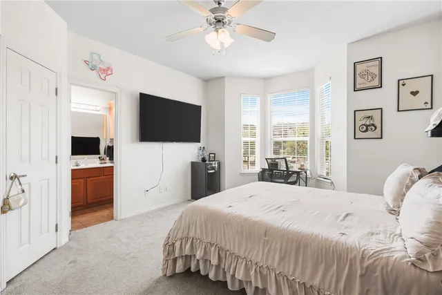 a bathroom with a sink toilet and mirror