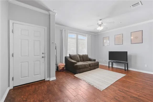 a kitchen with stainless steel appliances granite countertop a sink stove microwave and refrigerator