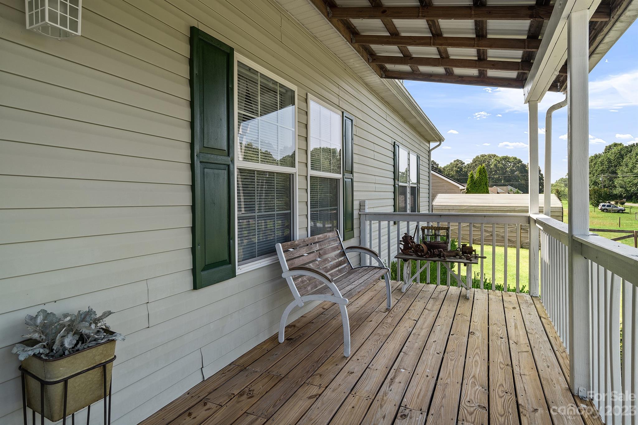 515 Brawley Road Cleveland, NC 27013 - Photo 13 of 39 a view of two chairs in the balcony