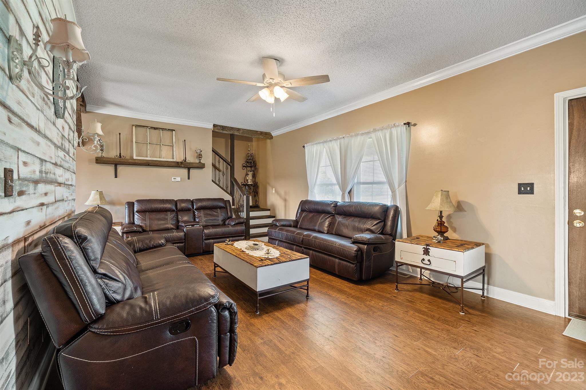 515 Brawley Road Cleveland, NC 27013 - Photo 15 of 39 a living room with furniture and a wooden floor