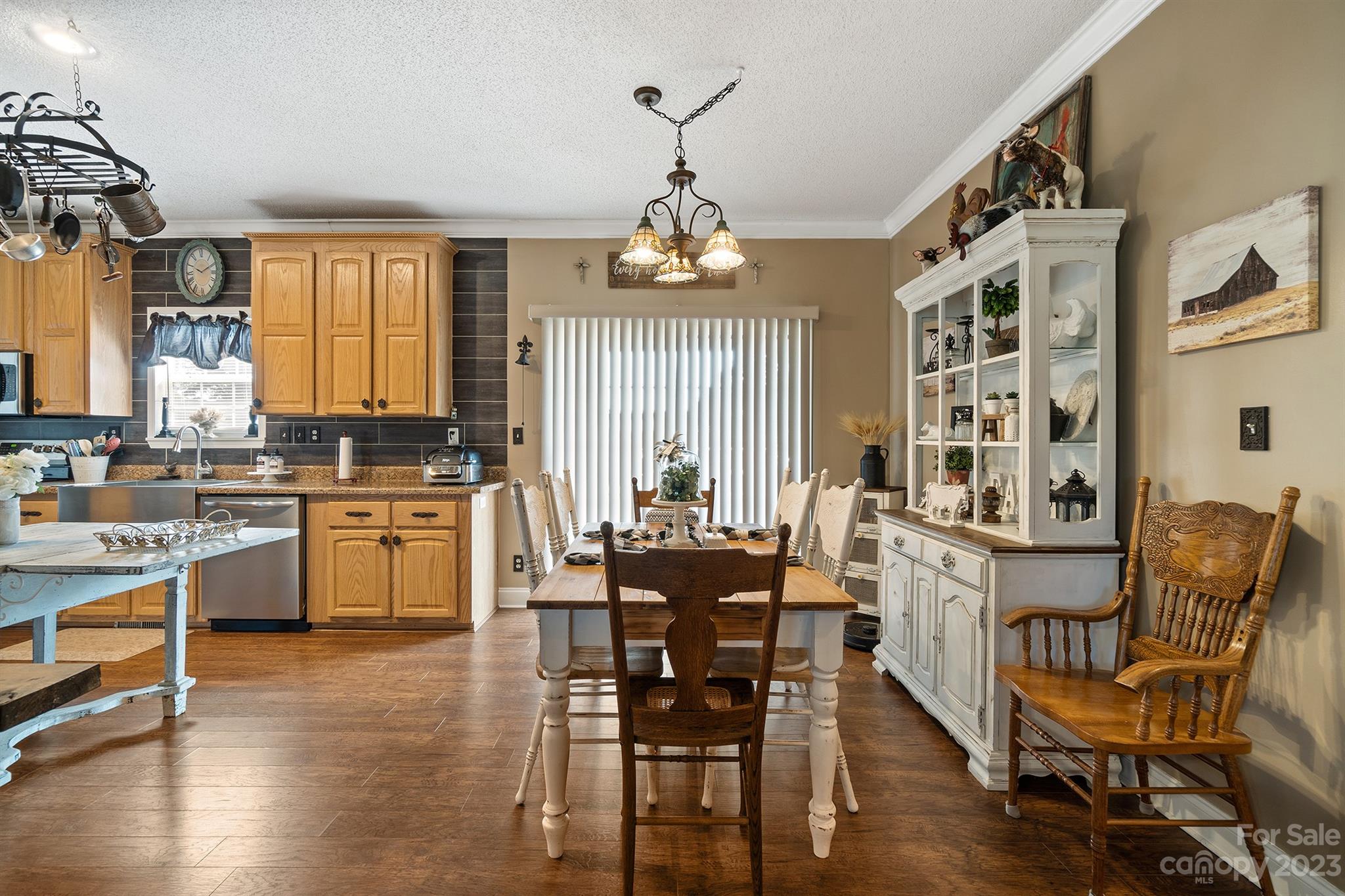 515 Brawley Road Cleveland, NC 27013 - Photo 18 of 39 a view of a dining room with furniture and wooden floor