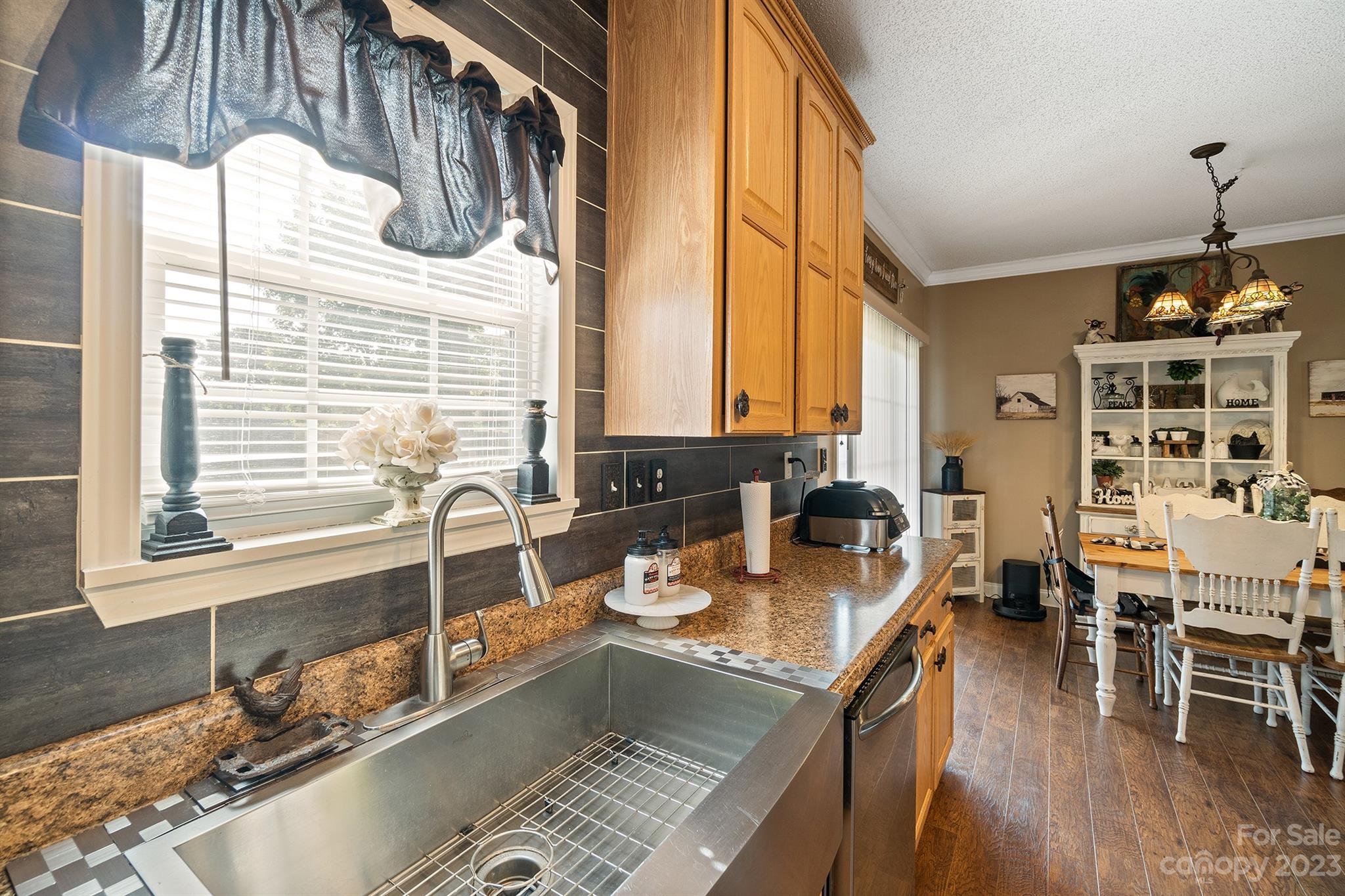 515 Brawley Road Cleveland, NC 27013 - Photo 27 of 39 a kitchen with sink refrigerator and window