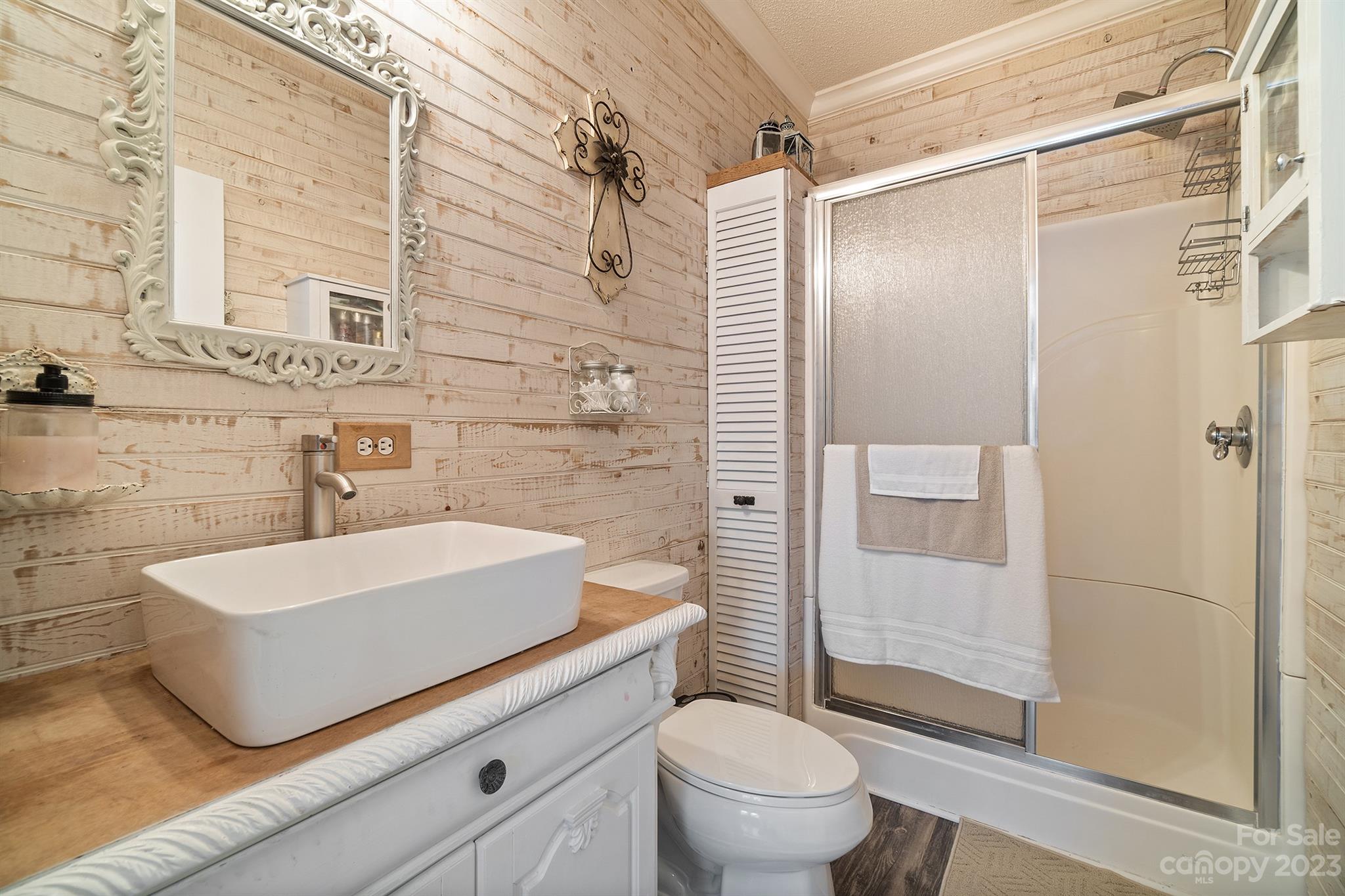 515 Brawley Road Cleveland, NC 27013 - Photo 33 of 39 a bathroom with a sink a toilet and shower