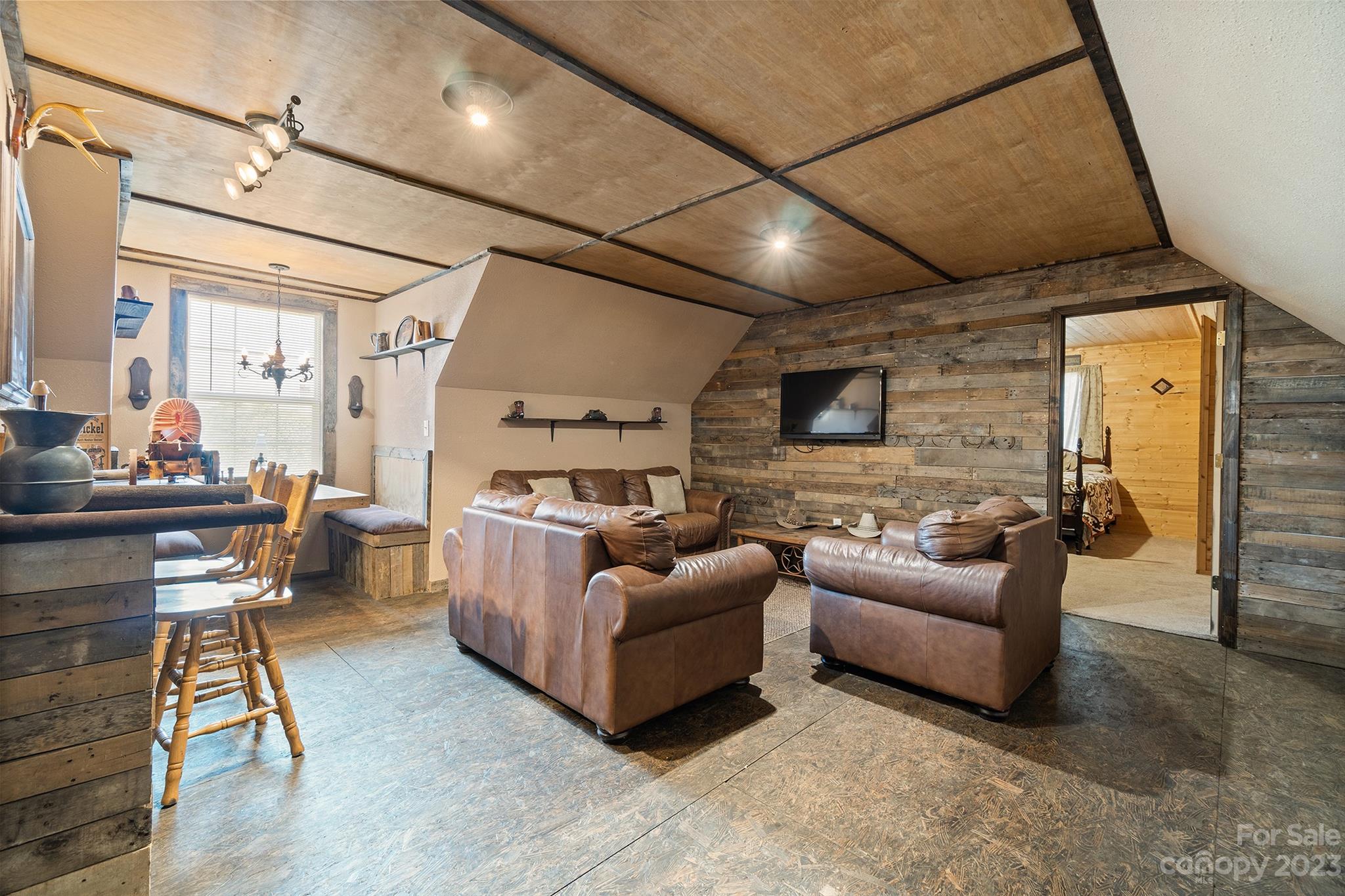 515 Brawley Road Cleveland, NC 27013 - Photo 35 of 39 a living room with furniture and a flat screen tv