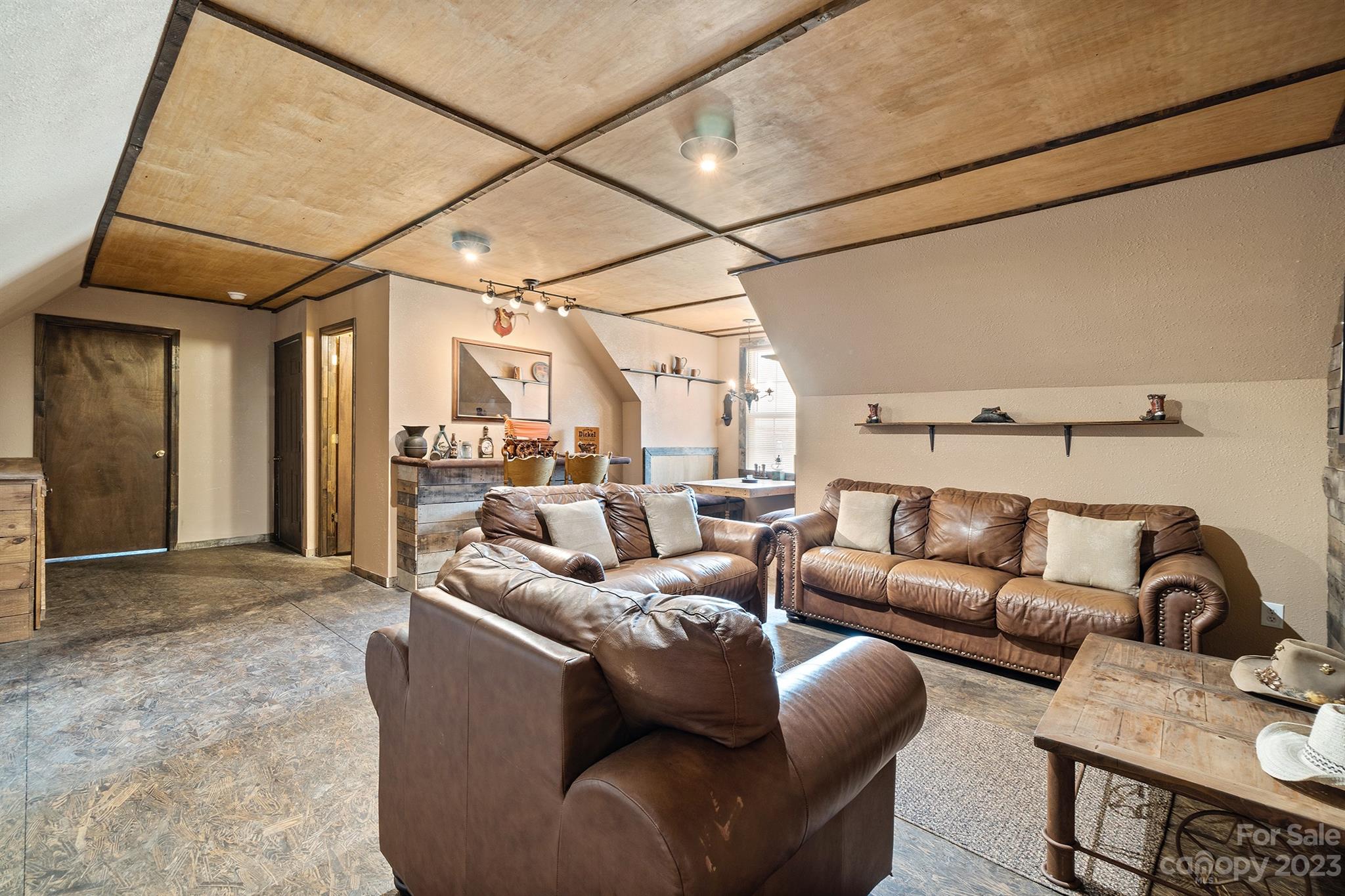 515 Brawley Road Cleveland, NC 27013 - Photo 36 of 39 a living room with furniture a bathtub and a window