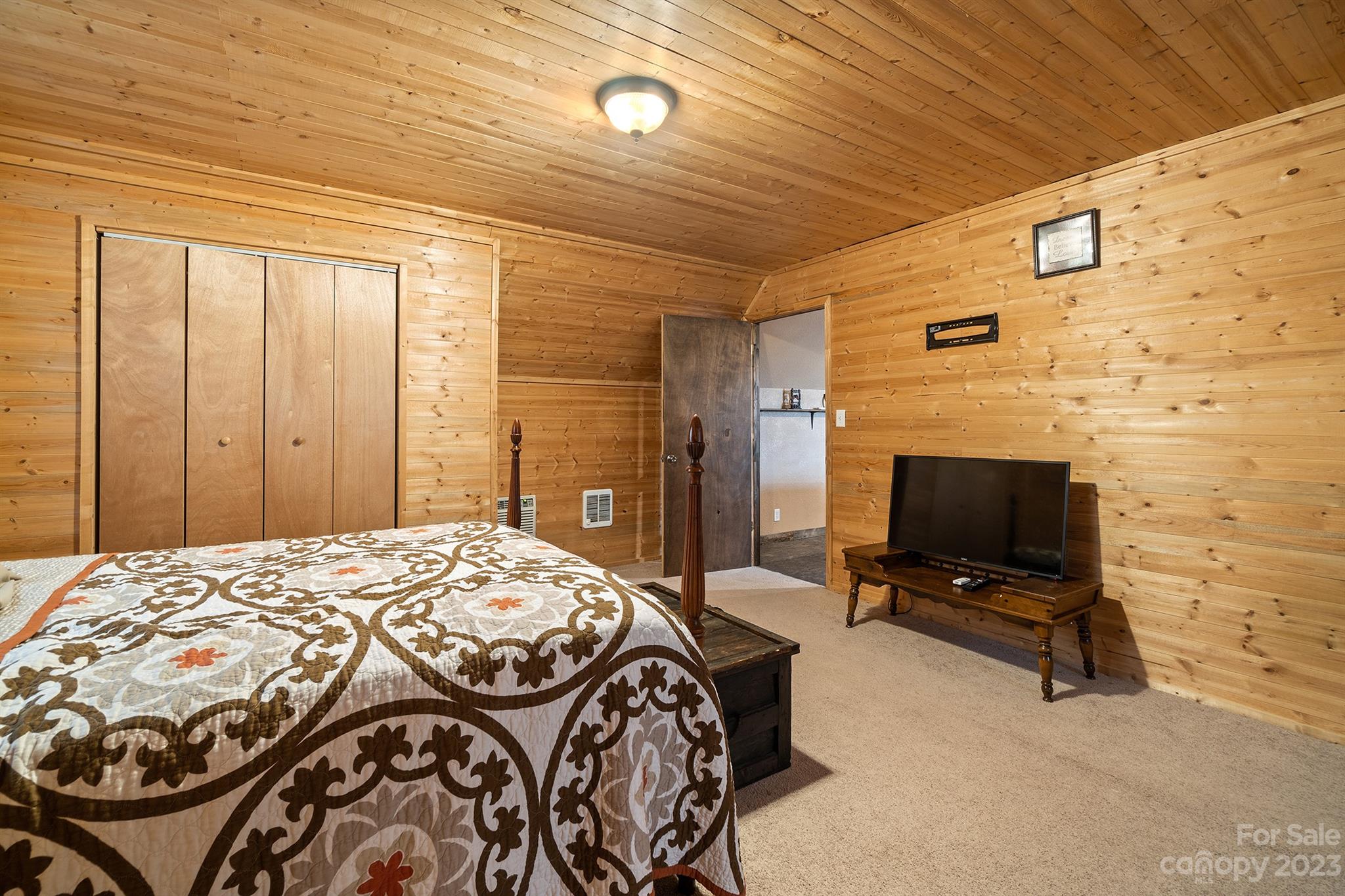 515 Brawley Road Cleveland, NC 27013 - Photo 39 of 39 a bedroom with a bed and flat screen tv