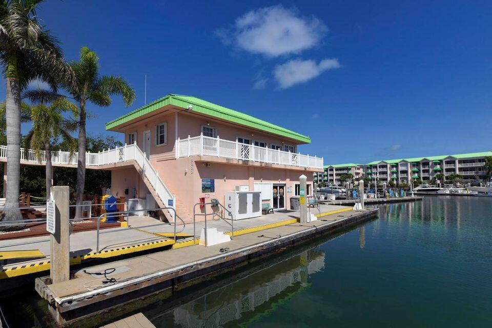 5555 College Road, Unit CONCH 8 Key West, FL 33040 - Photo 13 of 22 a view of swimming pool with outdoor seating