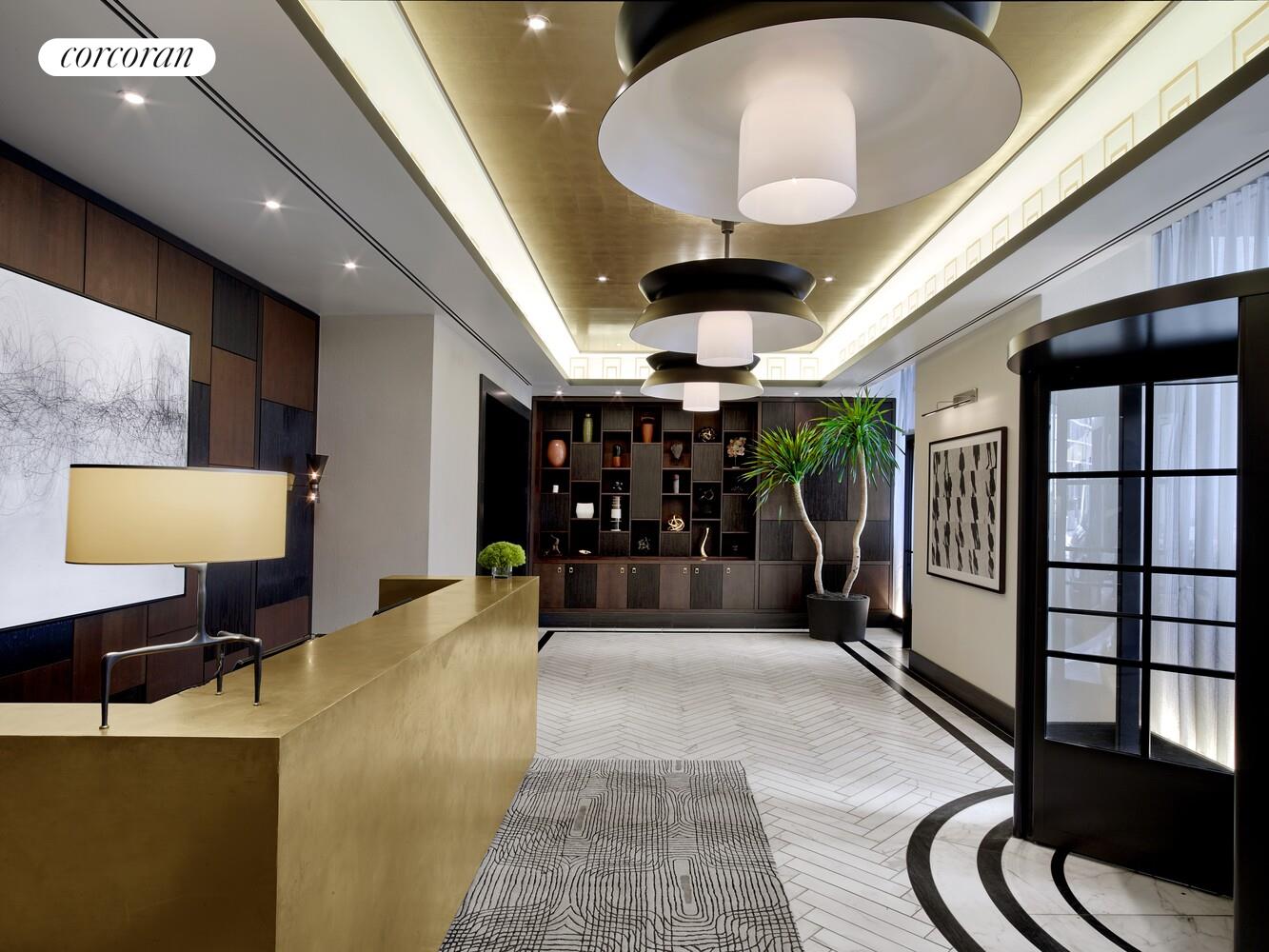 100 Barclay Street, Unit PHSOUTH Manhattan, NY 10007 - Photo 13 of 21 a lobby with furniture and chandelier