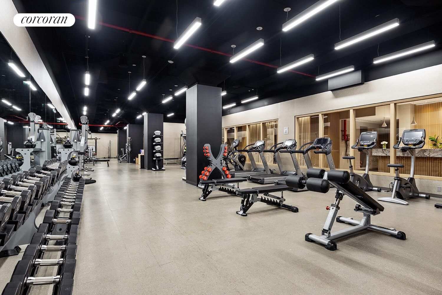 100 Barclay Street, Unit PHSOUTH Manhattan, NY 10007 - Photo 15 of 21 a view of a room with gym equipment