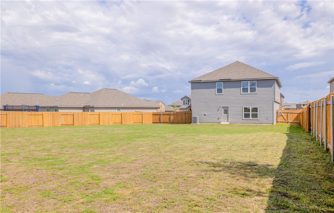 18513 Quiet Range Drive Elgin, TX 78621 - Photo 28 of 28 a view of an ocean from a house