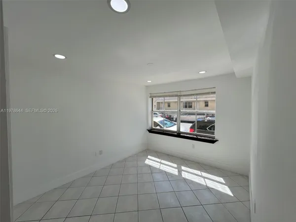 a bathroom with a toilet sink and a shower