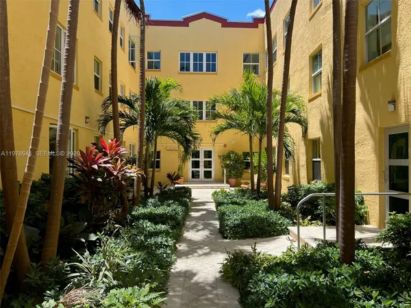 a view of a backyard with plants