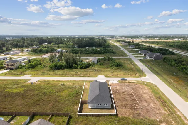 a view of swimming pool with a yard