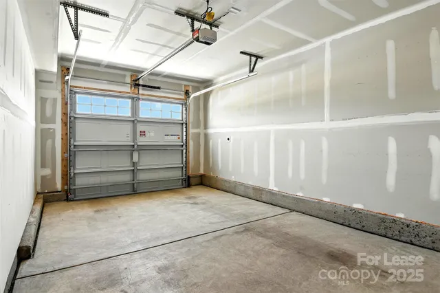 a view of an empty room with racks on the wall