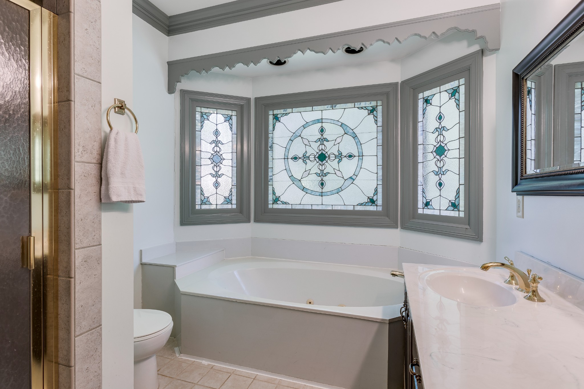 1111 Temple Ridge Court Nashville, TN 37221 - Photo 30 of 46 a bathroom with a bathtub a sink and a shower curtain