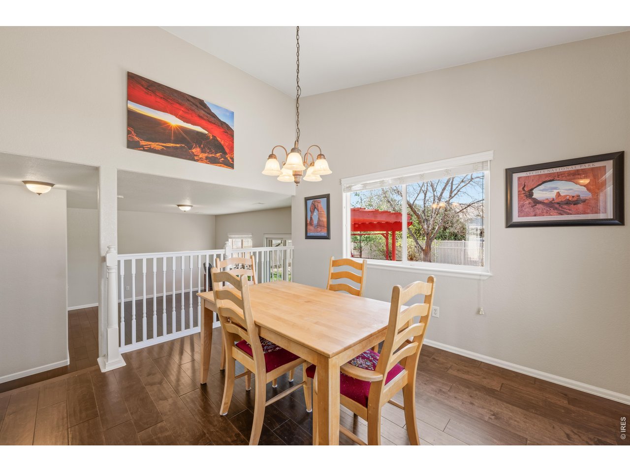9877 Buffalo Street Firestone, CO 80504 - Photo 10 of 40 a dining room with furniture and wooden floor