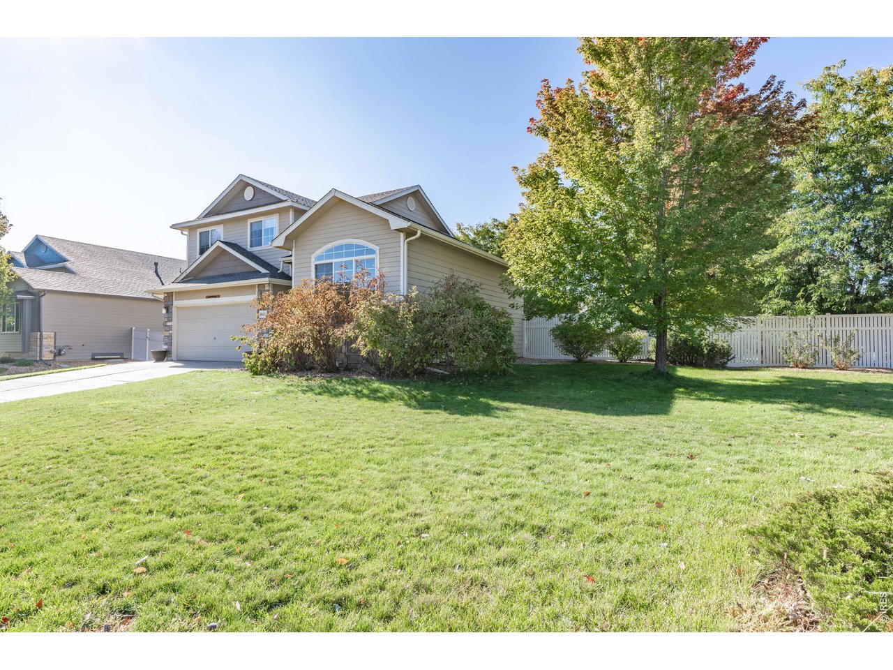 9877 Buffalo Street Firestone, CO 80504 - Photo 2 of 40 a house view with a outdoor space