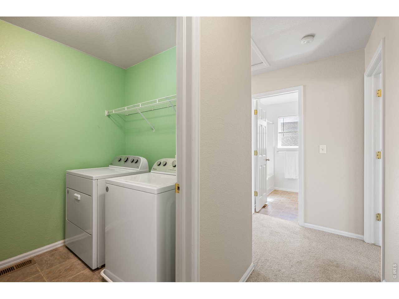 9877 Buffalo Street Firestone, CO 80504 - Photo 23 of 40 a utility room with dryer and washer