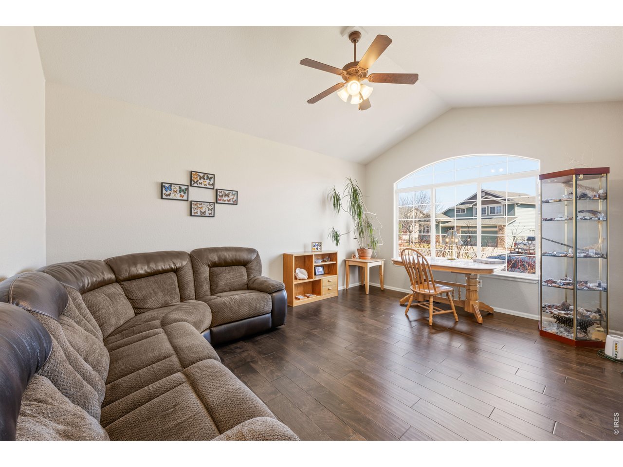 9877 Buffalo Street Firestone, CO 80504 - Photo 3 of 40 a living room with furniture and a large window
