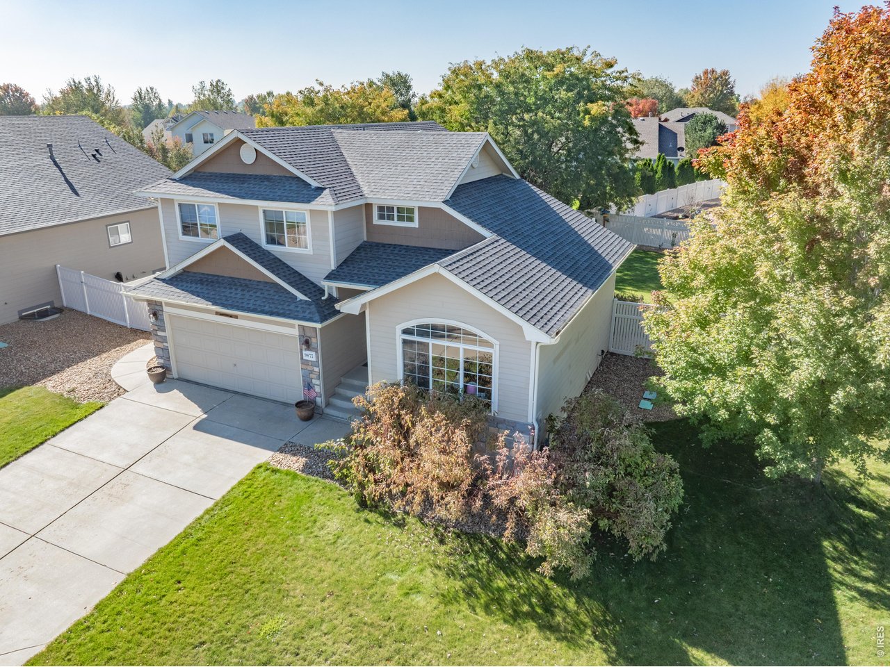 9877 Buffalo Street Firestone, CO 80504 - Photo 36 of 40 a aerial view of a house with a yard and potted plants