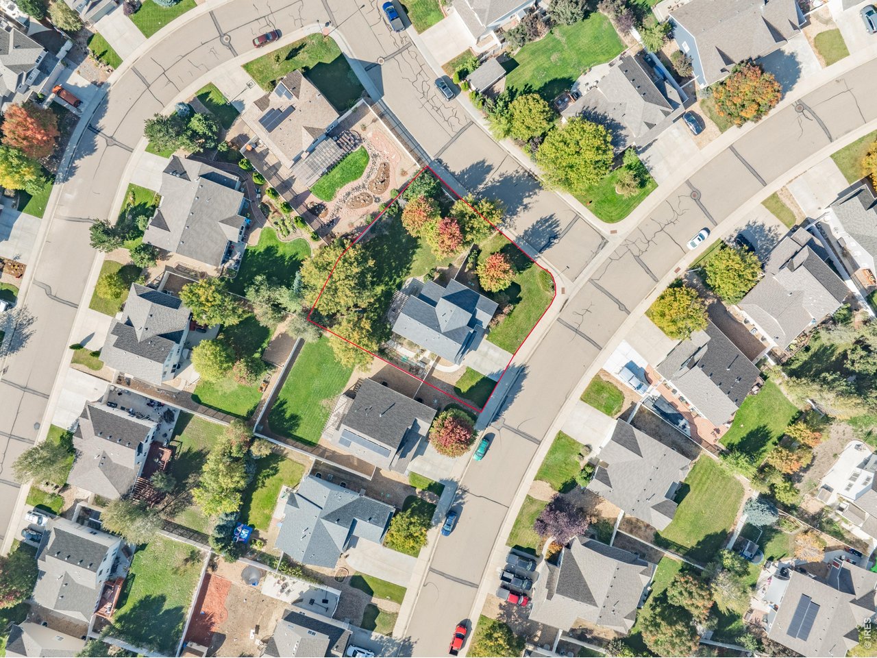 9877 Buffalo Street Firestone, CO 80504 - Photo 38 of 40 an aerial view of a house with a yard and ocean view