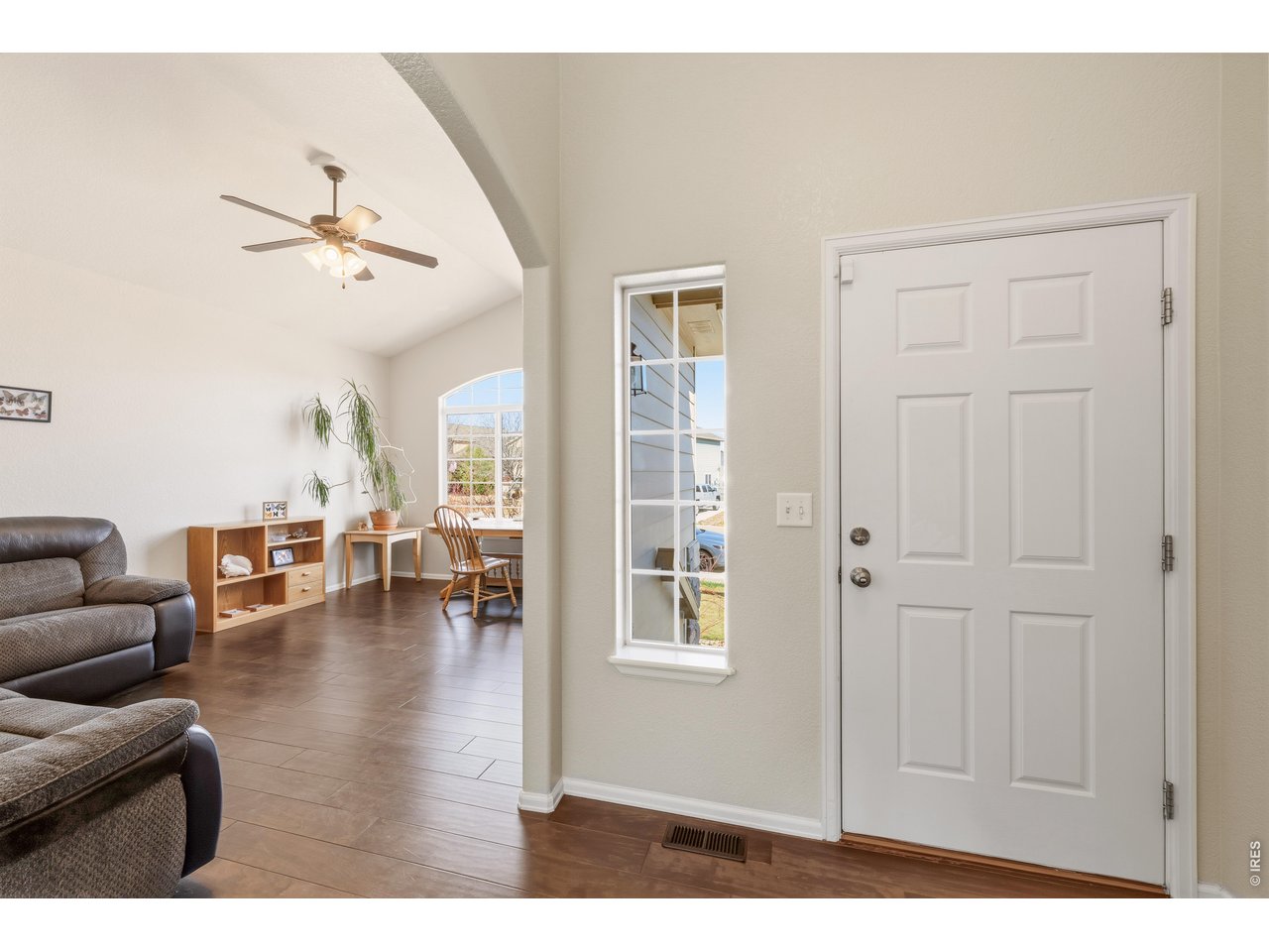 9877 Buffalo Street Firestone, CO 80504 - Photo 4 of 40 a view of livingroom with furniture and workspace