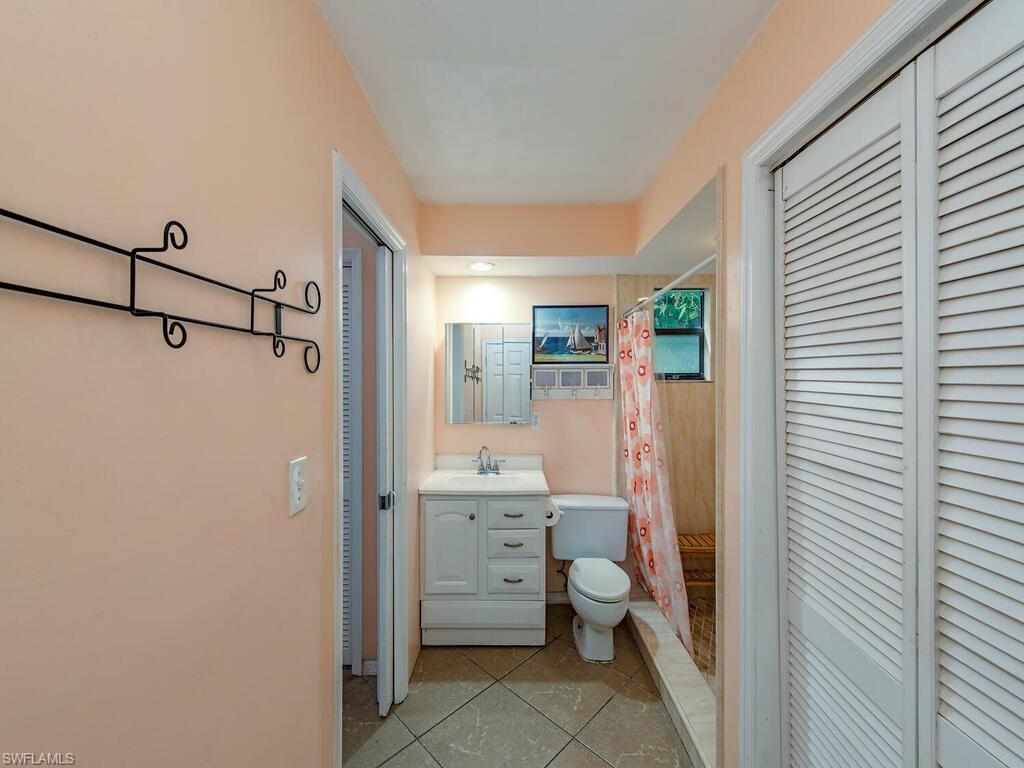 1351 Solana Road, Unit M2 Naples, FL 34103 - Photo 8 of 13 Main floor Master bath