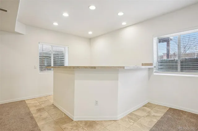 a house view with a backyard space