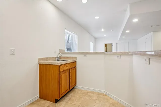 a view of a house with a snow in the background