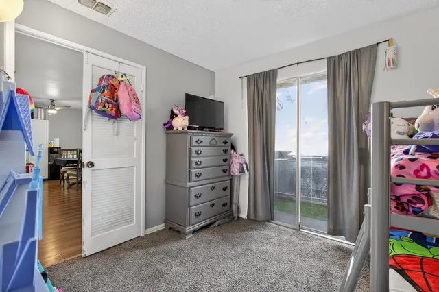 a view of a livingroom with furniture