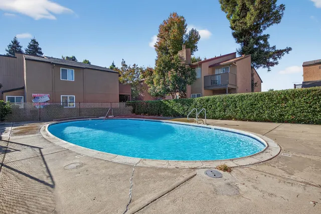 a view of outdoor space yard and swimming pool