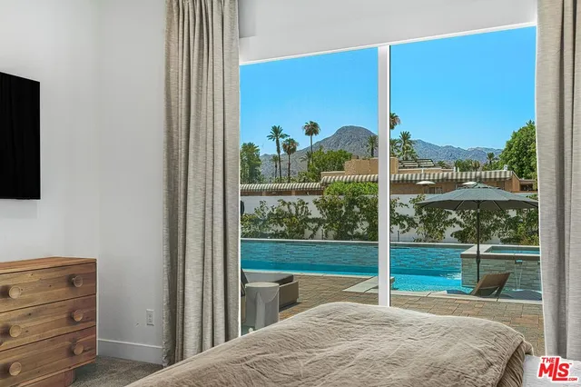 a view of a porch with a floor to ceiling window and a floor to ceiling window