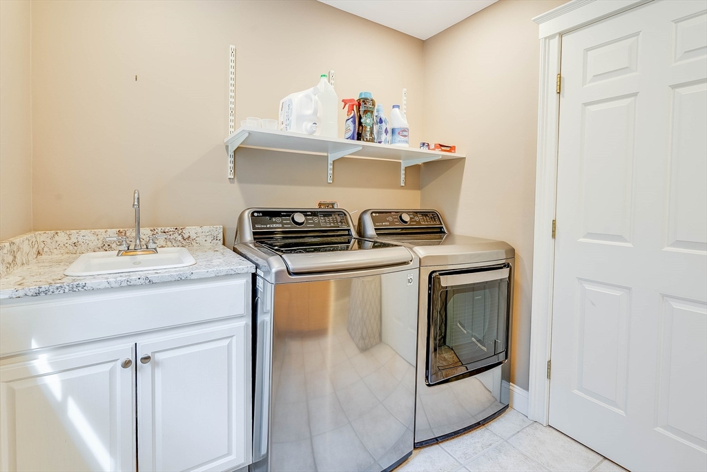 3 W Hollow Andover, MA 01810 - Photo 27 of 37 a kitchen with a stove and a sink