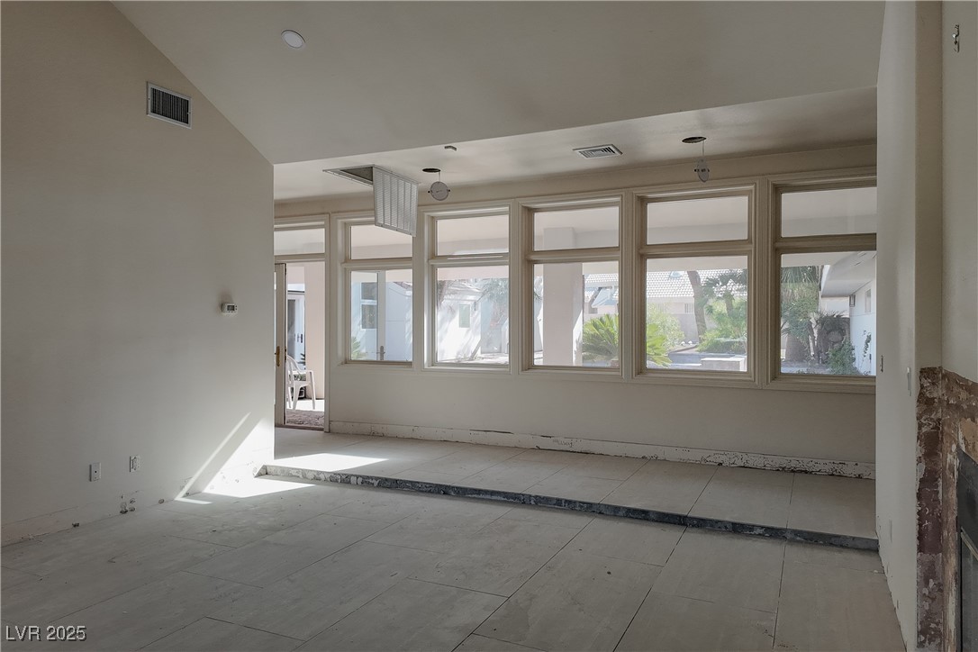 3840 South Topaz Road Las Vegas, NV 89121 - Photo 36 of 89 Spare room featuring lofted ceiling