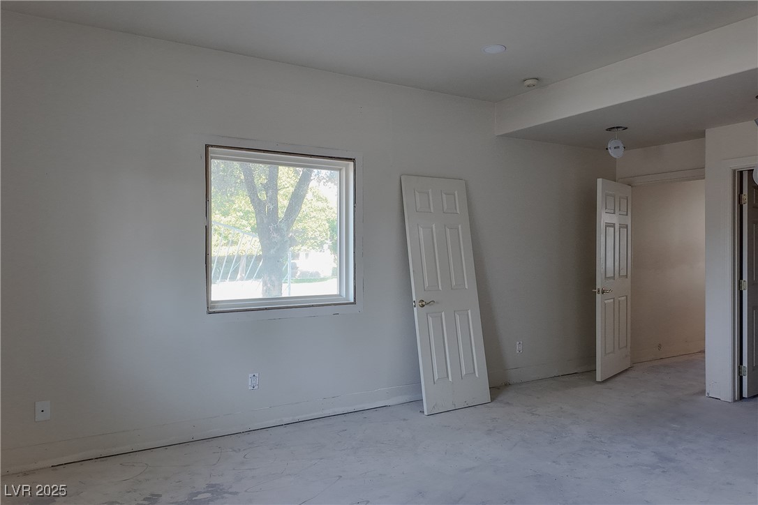 3840 South Topaz Road Las Vegas, NV 89121 - Photo 46 of 89 Unfurnished bedroom with baseboards and concrete flooring