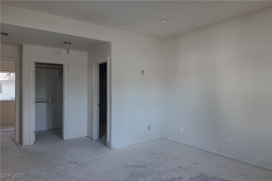 3840 South Topaz Road Las Vegas, NV 89121 - Photo 49 of 89 Unfurnished bedroom featuring a spacious closet and baseboards