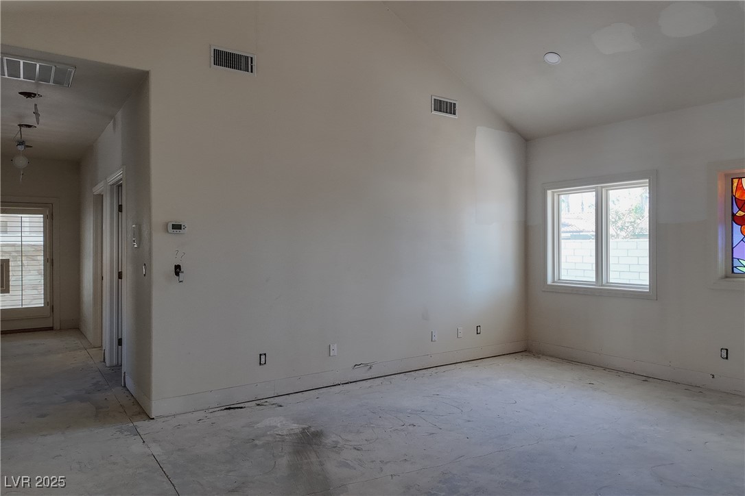 3840 South Topaz Road Las Vegas, NV 89121 - Photo 74 of 89 Unfurnished room featuring healthy amount of natural light and lofted ceiling
