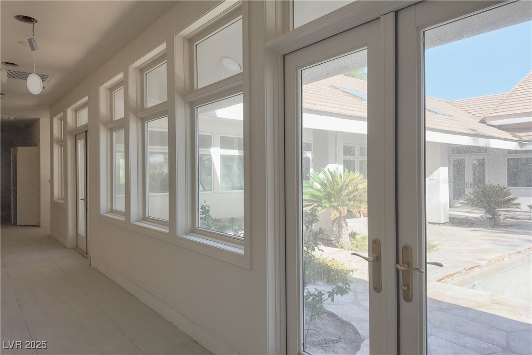 3840 South Topaz Road Las Vegas, NV 89121 - Photo 76 of 89 Doorway to outside featuring healthy amount of natural light
