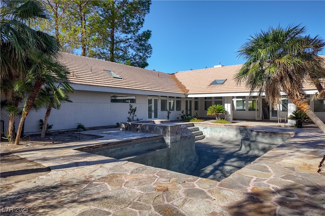 3840 South Topaz Road Las Vegas, NV 89121 - Photo 84 of 89 View of pool featuring a patio and a pool with connected hot tub
