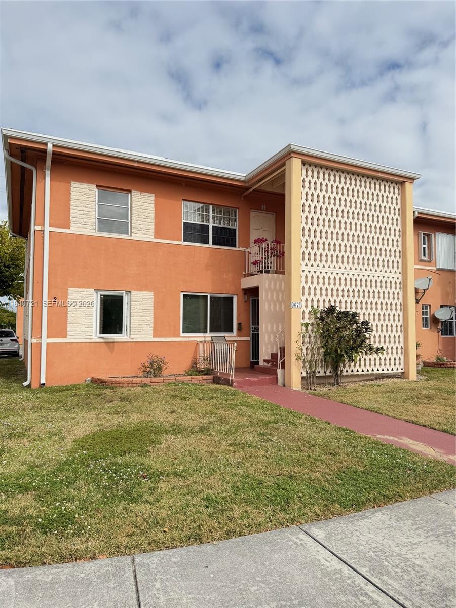 a house view with a outdoor space
