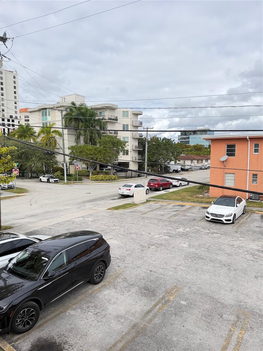 3671 Southwest 10th Street, Unit 9B Miami, FL 33135 - Photo 13 of 15 a view of a parking area